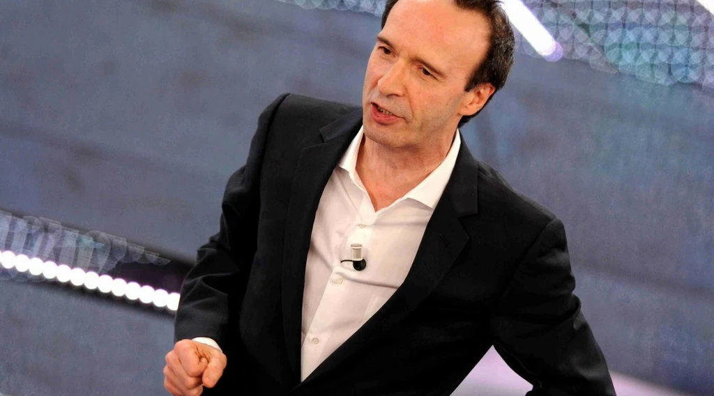 Sanremo 2025, Carlo Conti si gioca la carta rossa: Benigni all'Ariston. Tam-tam: di cosa parlerà