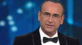 Tale e Quale Show, Carlo Conti su Signorini: "Non ricorro a quei mezzi", la bordata sul coming out di Garko al GF Vip