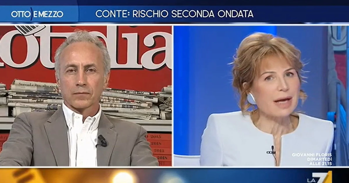 Lilli Gruber a Otto e mezzo: "Conte chiede alle banche un atto d'amore. Ma è Alice nel Paese delle meraviglie?". Travaglio in imbarazzo