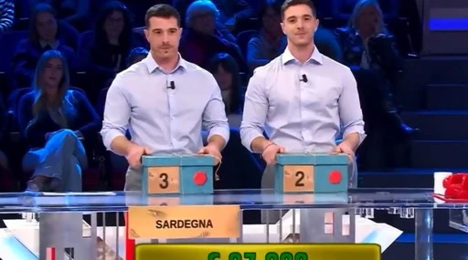Affari Tuoi, "proprio da barzelletta": i gemelli Andrea e Alessandro cambiano il pacco? Scoppia il panico