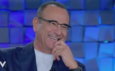 Verissimo, la rivelazione di Carlo Conti: "Guardando il mio conto corrente..."