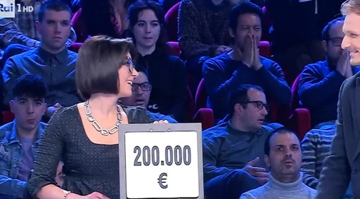 Affari tuoi, Flavio fregato dalla moglie? "Ha aperto il pacco da sola"