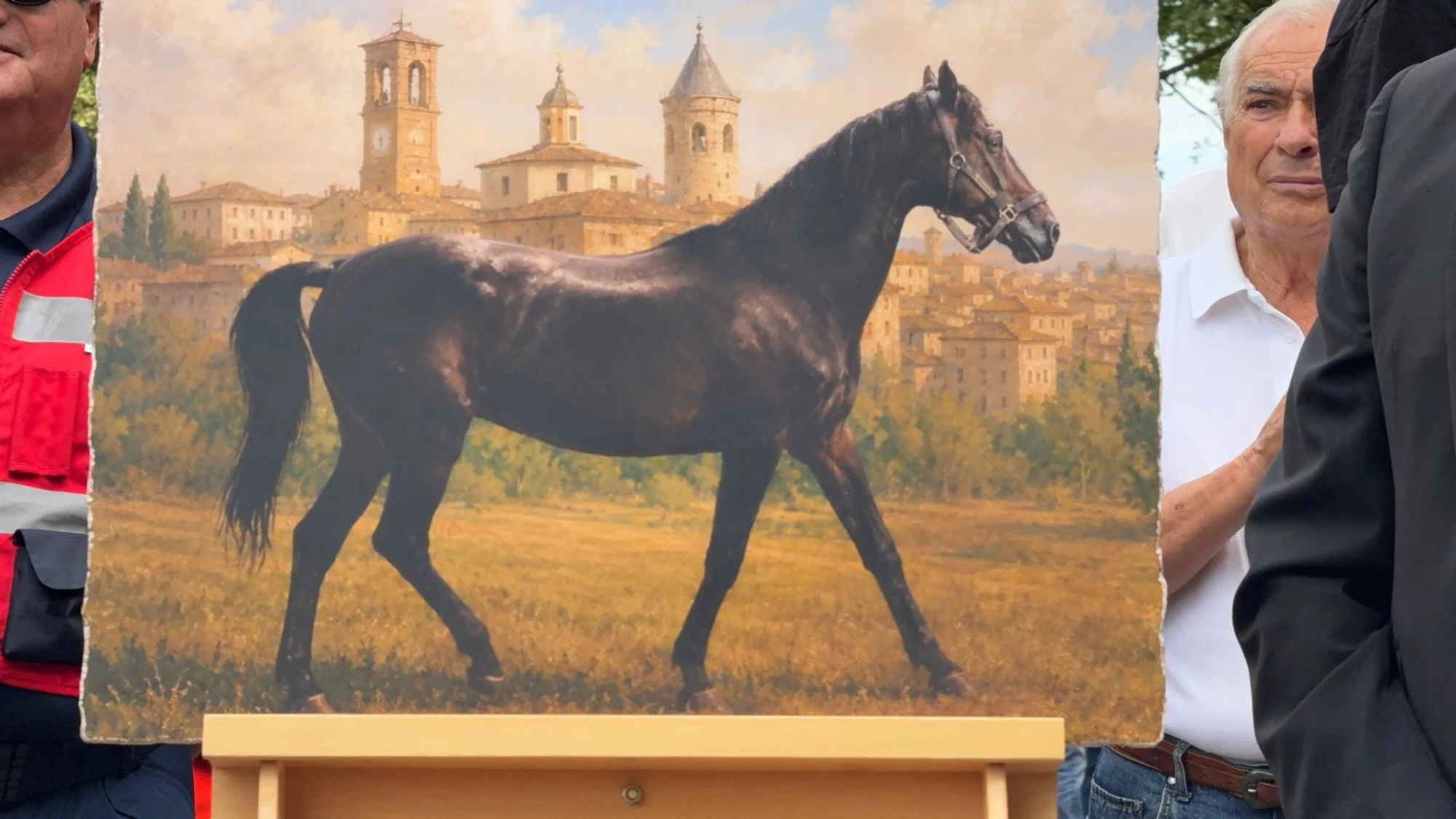 Un quadro raffigurante Varenne al driver Giampaolo Minnucci per ricordare la leggenda del trotto mondiale