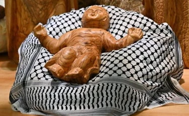 Finisce l'epoca del Bambin Gesù con la kefiah