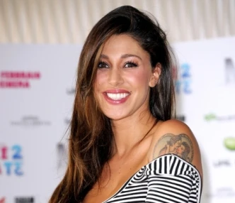 Belen Rodriguez a Cristiano Malgioglio: "Piuttosto che baciare lui mi limono con Carlino"