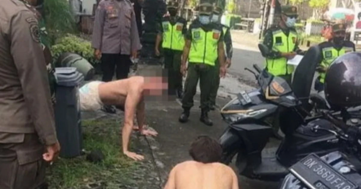 Covid, turisti senza mascherina a Bali. La sconcertante "punizione corporale", umiliati in pubblico