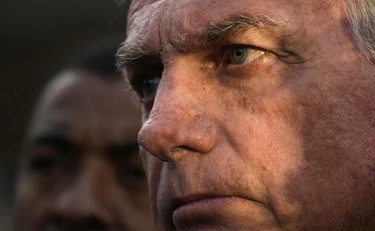 Bolsonaro tvega zaporno kazen in nosi elektronsko zapestnico