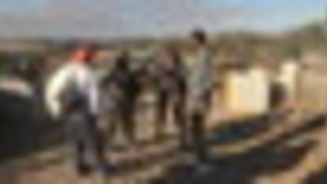 Le forze israeliane cacciano palestinesi venuti a raccogliere olive
