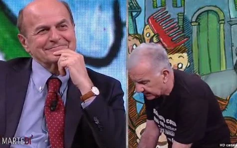 DiMartedì, Gene Gnocchi umilia Matteo Renzi. Guardate la faccia di Bersani quando vede la maglietta
