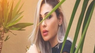 Anna Tatangelo assediata dal paparazzo? "Mettitela...", come lo massacra in un negozio