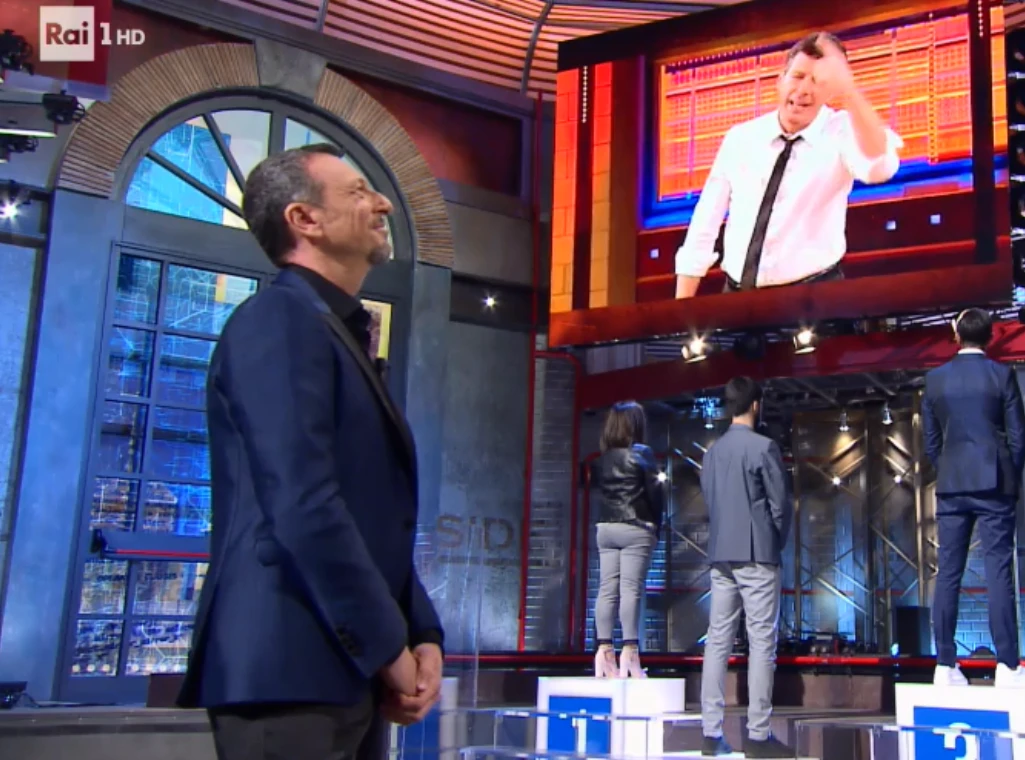 Amadeus e Fabrizio Frizzi, lacrime in diretta a I soliti ignoti: cosa va in onda un'anno dopo la morte