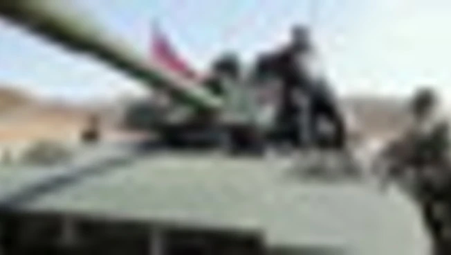 Il leader nordcoreano Kim Jong Un e sua figlia su un carro armato